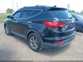 2016 Hyundai Santa Fe — photo 3 of 16 | VIN 5XYZU3LB1GG306672