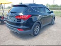 2016 Hyundai Santa Fe — photo 4 of 16 | VIN 5XYZU3LB1GG306672
