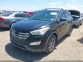 2016 Hyundai Santa Fe — photo 6 of 16 | VIN 5XYZU3LB1GG306672