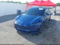 2025 Tesla Model 3 — photo 2 of 15 | VIN 5YJ3E1EA5SF034607