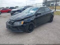 2015 Volkswagen Jetta — photo 2 of 11 | VIN 3VWD17AJ0FM410878