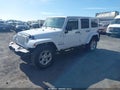 2015 Jeep Wrangler Unlimited — photo 2 of 16 | VIN 1C4BJWEGXFL548853