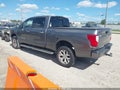 2016 Nissan Titan — photo 3 of 16 | VIN 1N6BA1F41GN508820