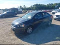 2015 Chevrolet Sonic — photo 2 of 17 | VIN 1G1JC5SHXF4181307