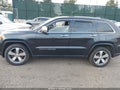2014 Jeep Grand Cherokee — photo 14 of 17 | VIN 1C4RJFBG2EC131258