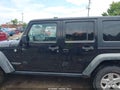2014 Jeep Wrangler Unlimited — photo 14 of 16 | VIN 1C4BJWFG3EL114755