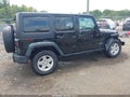 2014 Jeep Wrangler Unlimited — photo 4 of 16 | VIN 1C4BJWFG3EL114755