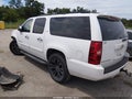 2007 Chevrolet Suburban 1500 — photo 3 of 15 | VIN 3GNFC16077G115027