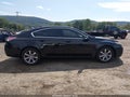 2013 Acura TL — photo 13 of 16 | VIN 19UUA8F23DA012599