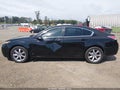 2013 Acura TL — photo 14 of 16 | VIN 19UUA8F23DA012599