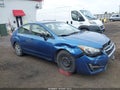 2016 Subaru Impreza — photo 13 of 21 | VIN JF1GJAA63GH009992
