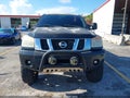 2010 Nissan Titan — photo 12 of 16 | VIN 1N6BA0EC3AN321105