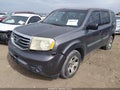 2014 Honda Pilot — photo 2 of 16 | VIN 5FNYF3H28EB023057