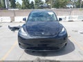 2025 Tesla Model Y — photo 13 of 20 | VIN 7SAYGDEE2SF232374