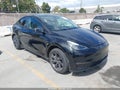 2025 Tesla Model Y — photo 1 of 20 | VIN 7SAYGDEE2SF232374