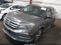 2016 Honda Pilot — photo 2 of 16 | VIN 5FNYF5H92GB034468