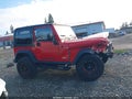 2004 Jeep Wrangler — photo 14 of 18 | VIN 1J4FA69S44P728863