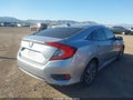 2018 Honda Civic — photo 4 of 15 | VIN 2HGFC2F73JH590131