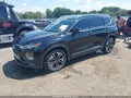 2019 Hyundai Santa Fe — photo 2 of 19 | VIN 5NMS53AA6KH046275