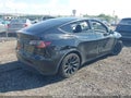 2021 Tesla Model Y — photo 4 of 15 | VIN 5YJYGDEE6MF061936
