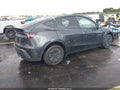 2026 Tesla Model Y — photo 4 of 14 | VIN 7SAYGDED8TA592920