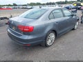 2015 Volkswagen Jetta — photo 4 of 16 | VIN 3VWD17AJ8FM229270