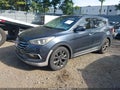 2018 Hyundai Santa Fe — photo 2 of 11 | VIN 5NMZW4LA3JH056372