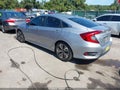 2016 Honda Civic — photo 3 of 20 | VIN 2HGFC1F73GH638679