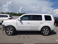 2013 Honda Pilot — photo 14 of 16 | VIN 5FNYF3H54DB020066