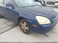 2006 Kia Optima — photo 6 of 11 | VIN KNAGE123565053217