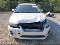 2014 Subaru Impreza — photo 12 of 16 | VIN JF1GJAC62EH025322