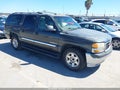 2003 GMC Yukon XL — photo 1 of 11 | VIN 1GKEC16T23J145824