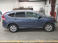 2014 Honda CR-V — photo 14 of 17 | VIN 5J6RM4H70EL048733