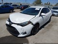 2018 Toyota Corolla — photo 2 of 18 | VIN 5YFBURHE9JP742826