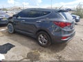 2018 Hyundai Santa Fe — photo 3 of 16 | VIN 5XYZTDLB2JG569219