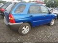 2007 Kia Sportage — photo 4 of 11 | VIN KNDJF724777359620