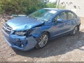 2015 Subaru Impreza — photo 2 of 16 | VIN JF1GJAS63FH020097
