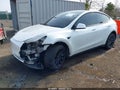2022 Tesla Model Y — photo 2 of 20 | VIN 7SAYGAEE7NF361486