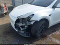 2022 Tesla Model Y — photo 6 of 20 | VIN 7SAYGAEE7NF361486
