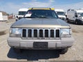 1998 Jeep Grand Cherokee — photo 6 of 12 | VIN 1J4GZ58S5WC131403