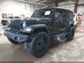 2021 Jeep Wrangler Unlimited — photo 2 of 16 | VIN 1C4HJXDN2MW836393