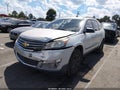 2014 Chevrolet Traverse — photo 2 of 16 | VIN 1GNKRFED3EJ329099