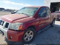 2007 Nissan Titan — photo 2 of 10 | VIN 1N6BA06A67N220839