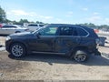 2016 BMW X5 — photo 14 of 16 | VIN 5UXKS4C57G0N14163
