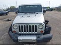 2011 Jeep Wrangler — photo 12 of 16 | VIN 1J4AA5D1XBL585814