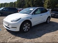 2022 Tesla Model Y — photo 2 of 20 | VIN 7SAYGDEE2NF362269