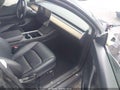 2022 Tesla Model Y — photo 5 of 15 | VIN 7SAYGDEE5NF307685