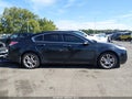 2009 Acura TL — photo 13 of 16 | VIN 19UUA86549A017540