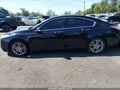 2009 Acura TL — photo 14 of 16 | VIN 19UUA86549A017540