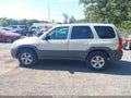 2005 Mazda Tribute — photo 14 of 16 | VIN 4F2YZ02Z65KM01827